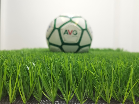 CHINA A grama artificial atapeta os esportes falsificados da grama que pavimentam 55mm para a corte do futebol fornecedor